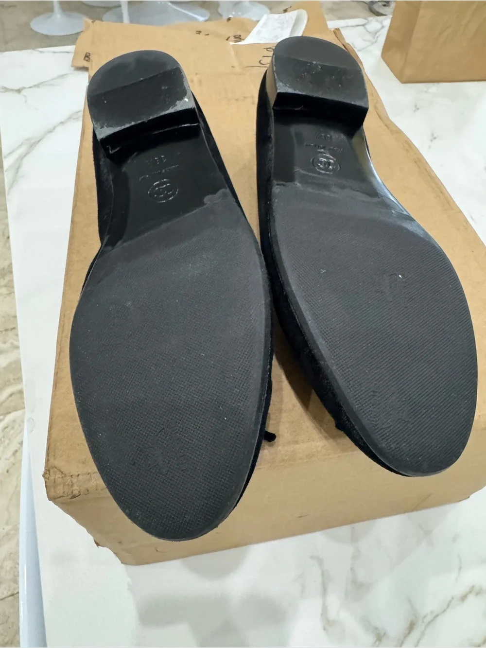 CHANEL Black Suede Ballet Flats with Embroidered CC and Bow Accent